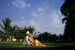 Candid couple moment during an Indian wedding in Hyderabad, captured outdoors.
